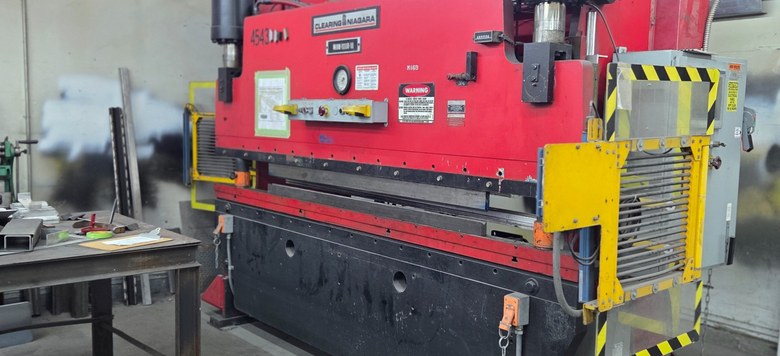 C.C. Ironworks 100 ton press brake in the shop